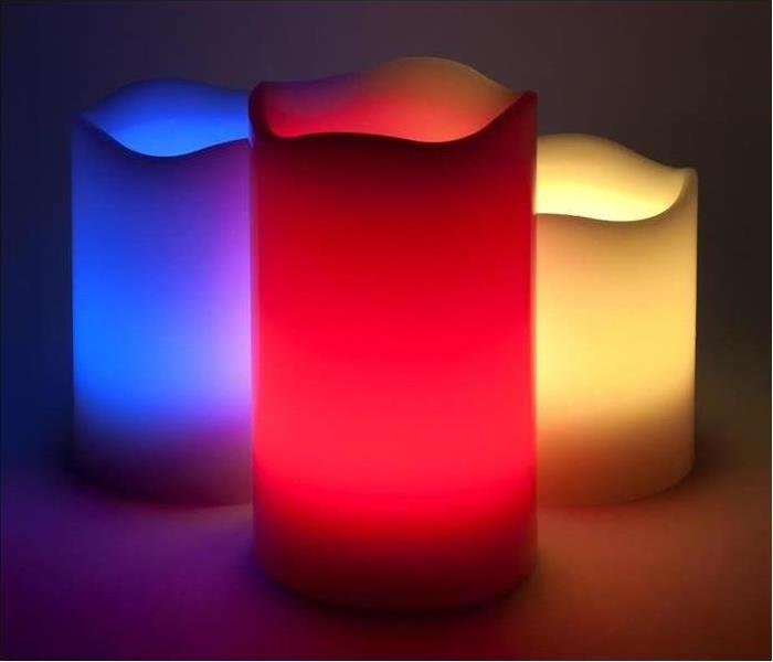 Three different size LED candles